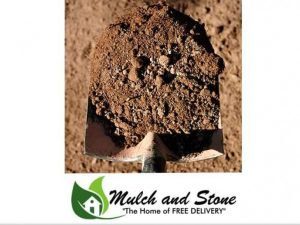 Mulch and Stone truck delivering wholesale compost to customer site