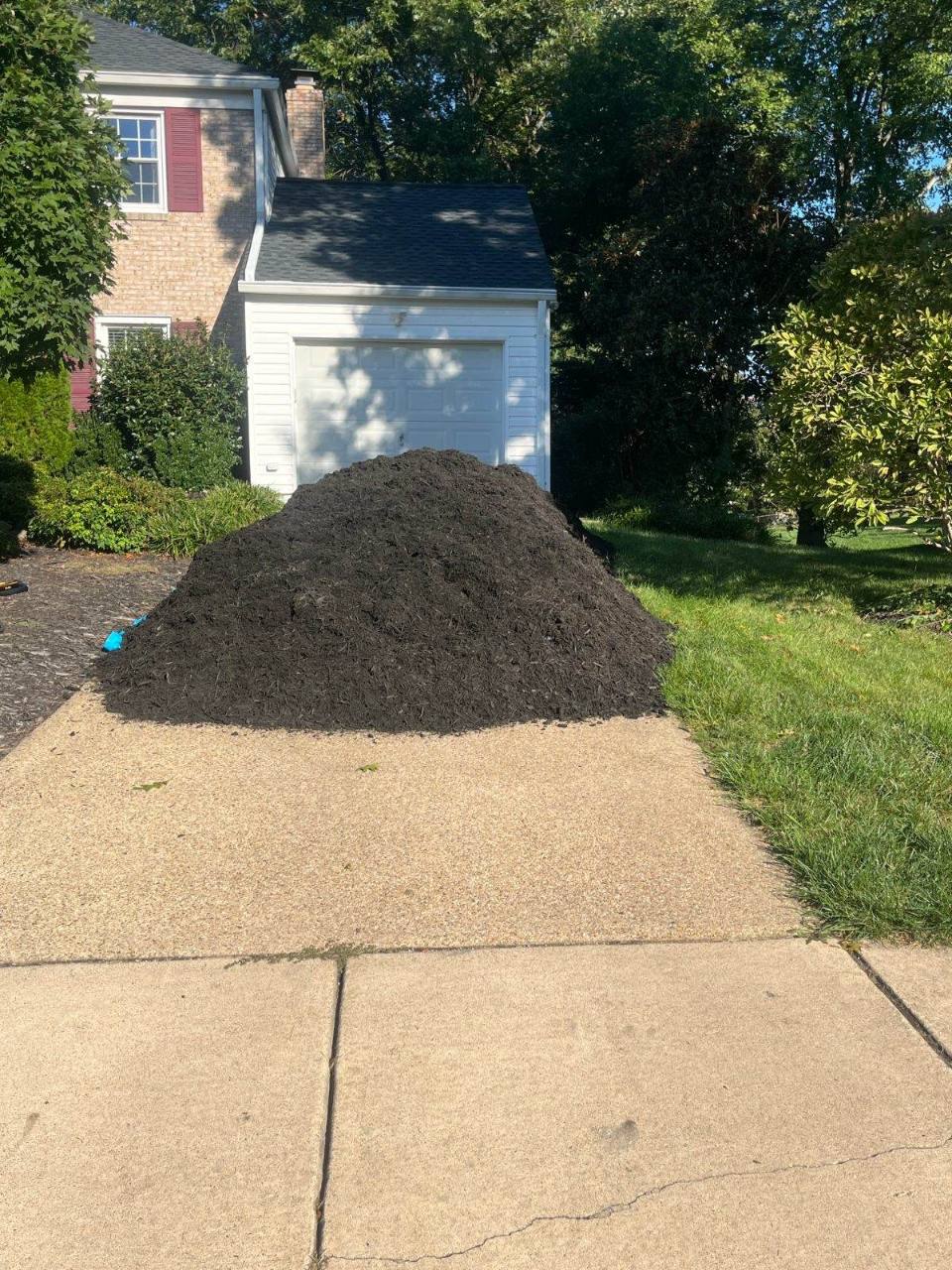Bulk black mulch delivered by Mulch & Stone in Alexandria, VA