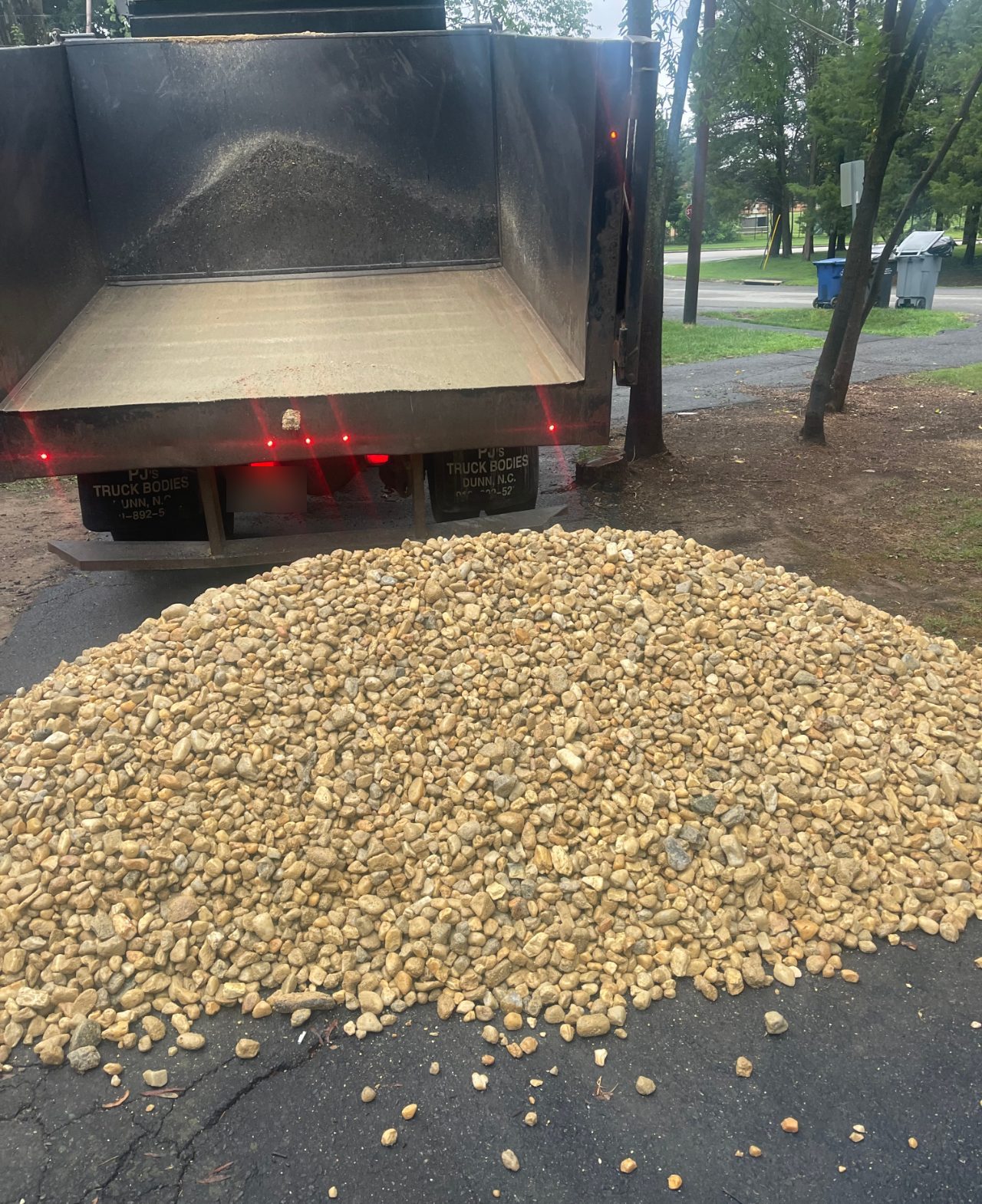 Bulk river gravel delivered by Mulch & Stone in Alexandria, VA