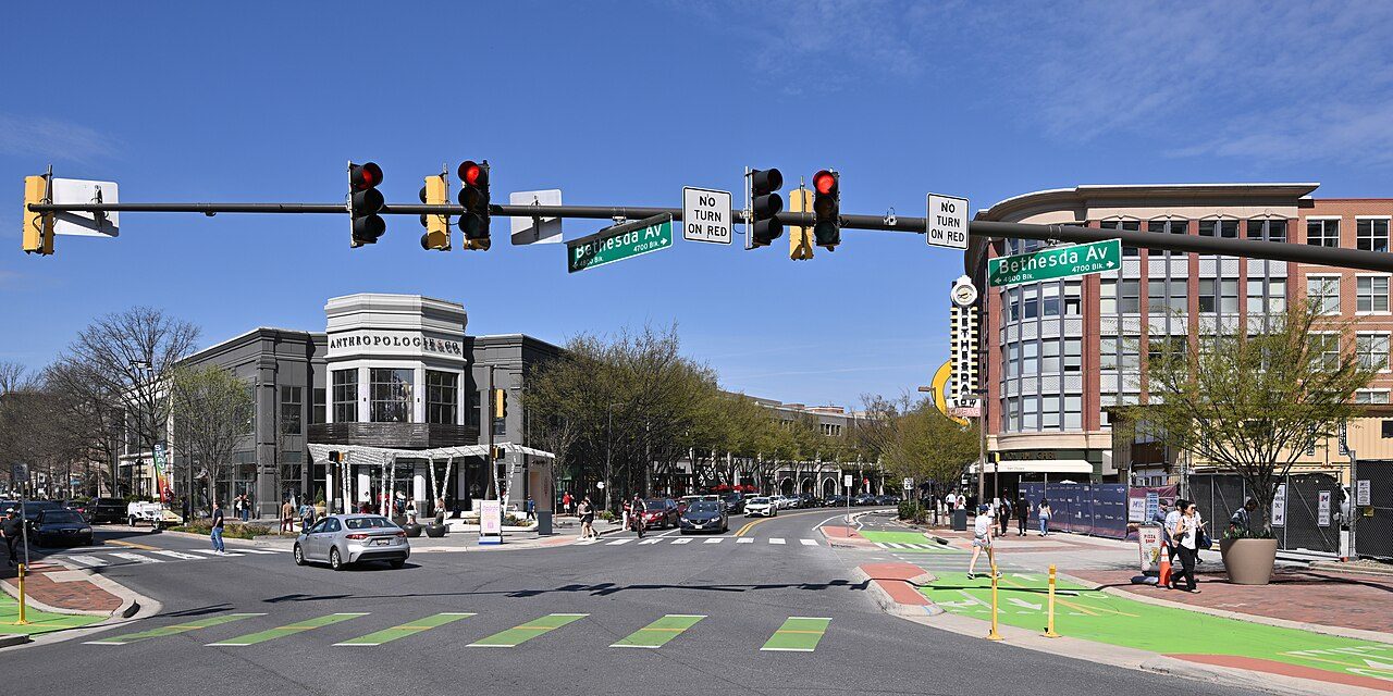 Downtown Bethesda at Woodmont and Bethesda Avenues with trees leafing out in spring