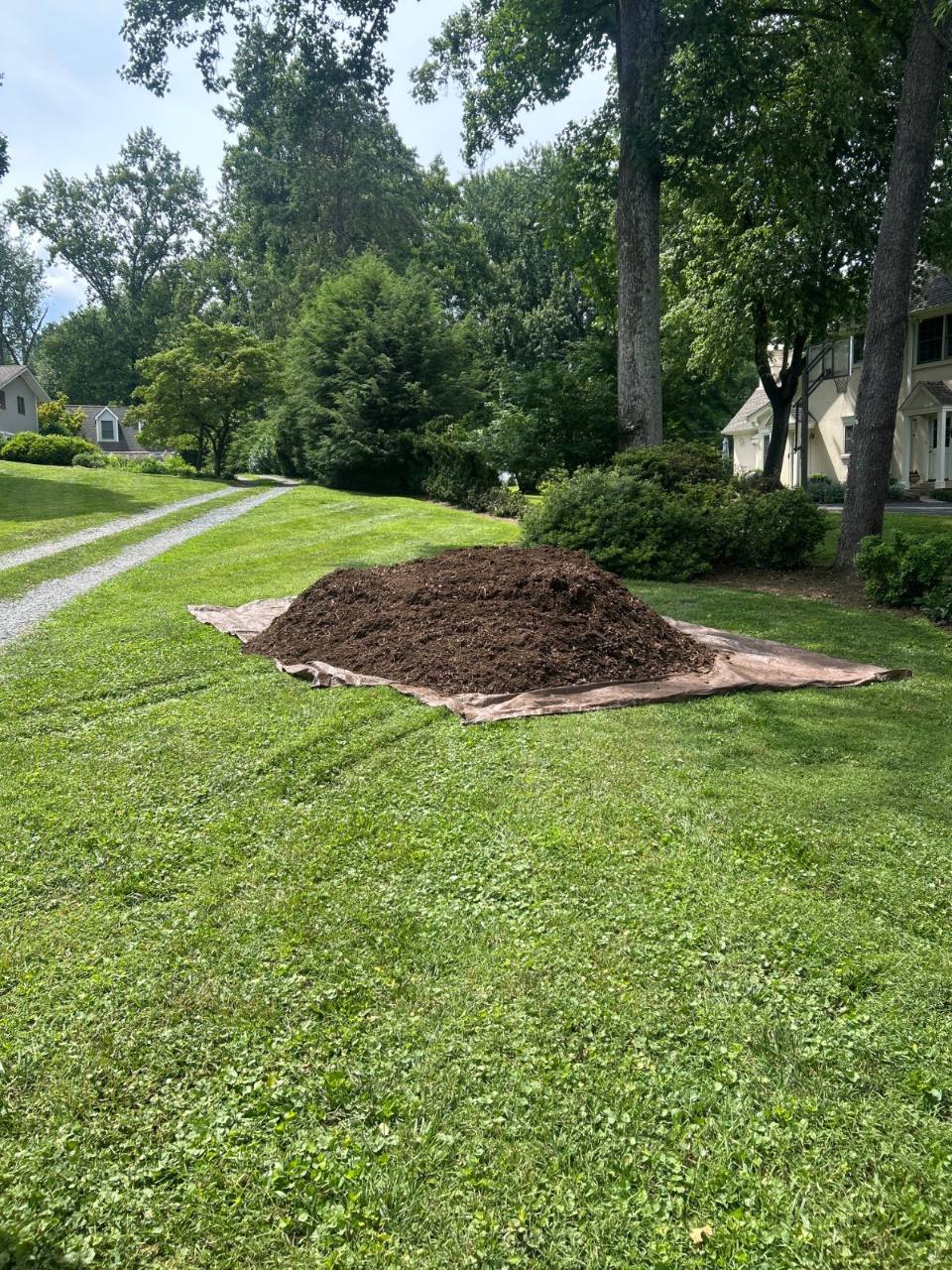 Bulk double shredded hardwood mulch delivered by Mulch & Stone in Great Falls, VA