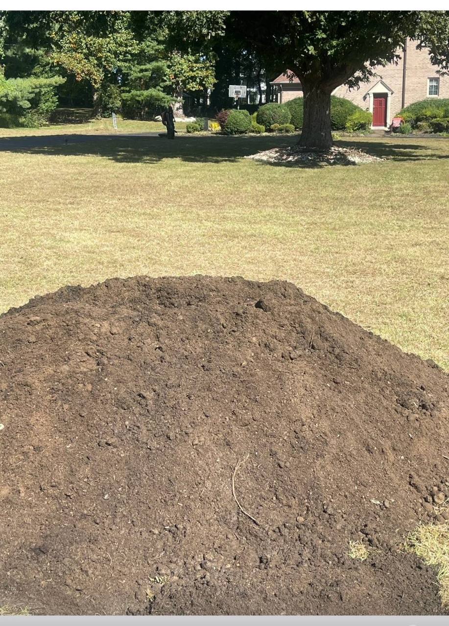 Bulk topsoil-compost mix delivered by Mulch & Stone in Potomac, MD