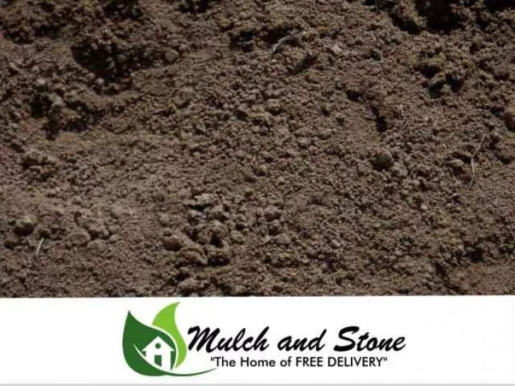 Close-up of rich, dark organic compost used to improve garden soil health