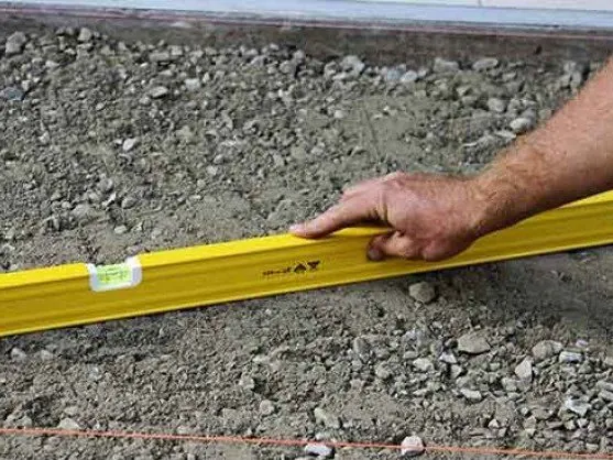 Leveling a crush and run gravel base