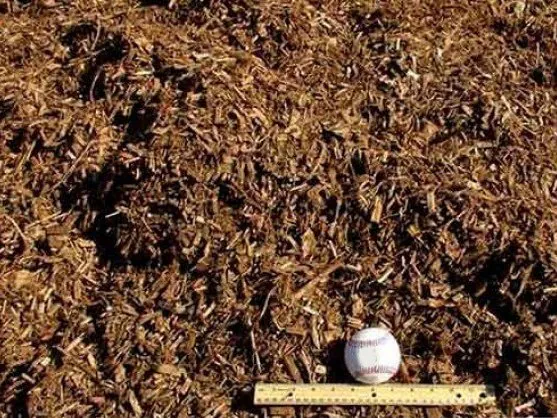 Close-up of double shredded hardwood mulch texture