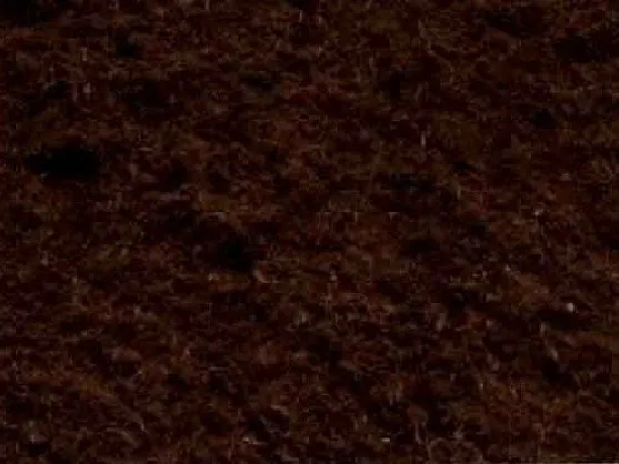Close-up of dyed brown mulch