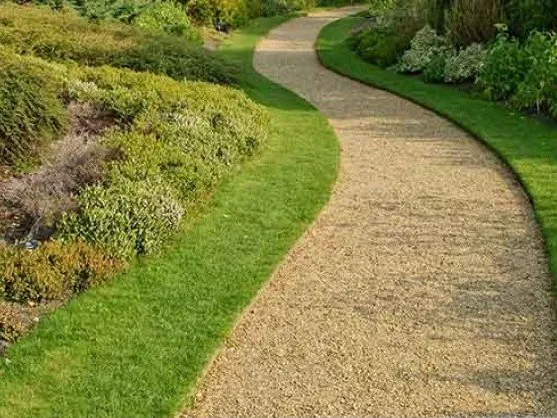 Winding garden path made with pea gravel