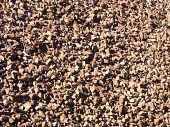 Close-up of red 3/4 inch decorative gravel