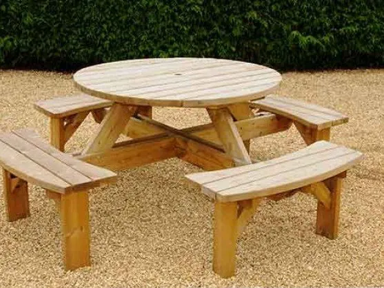 Picnic table on a river washed gravel patio