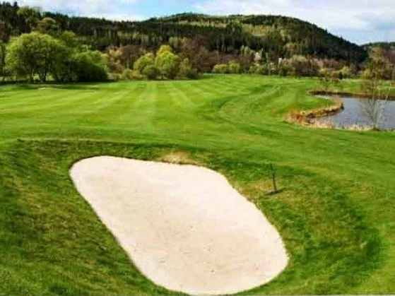 White sand in a golf course bunker