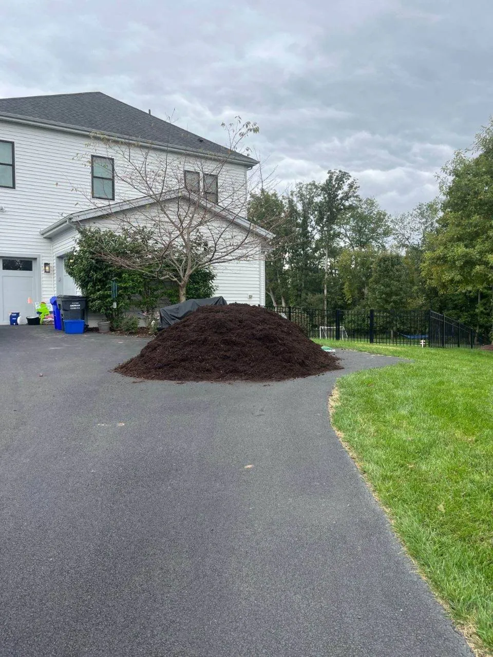 Brown mulch delivered to a long driveway in Northern Virginia